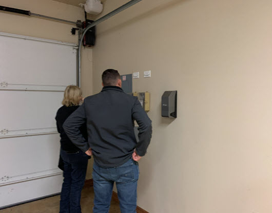 inspecting garage door entry